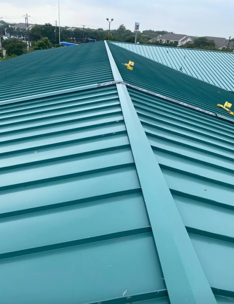 Green commercial metal roof ridge and valley for Metal Roof Repair in Newington Forest